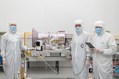 Engineers test the AWE instrument in a cleanroom.