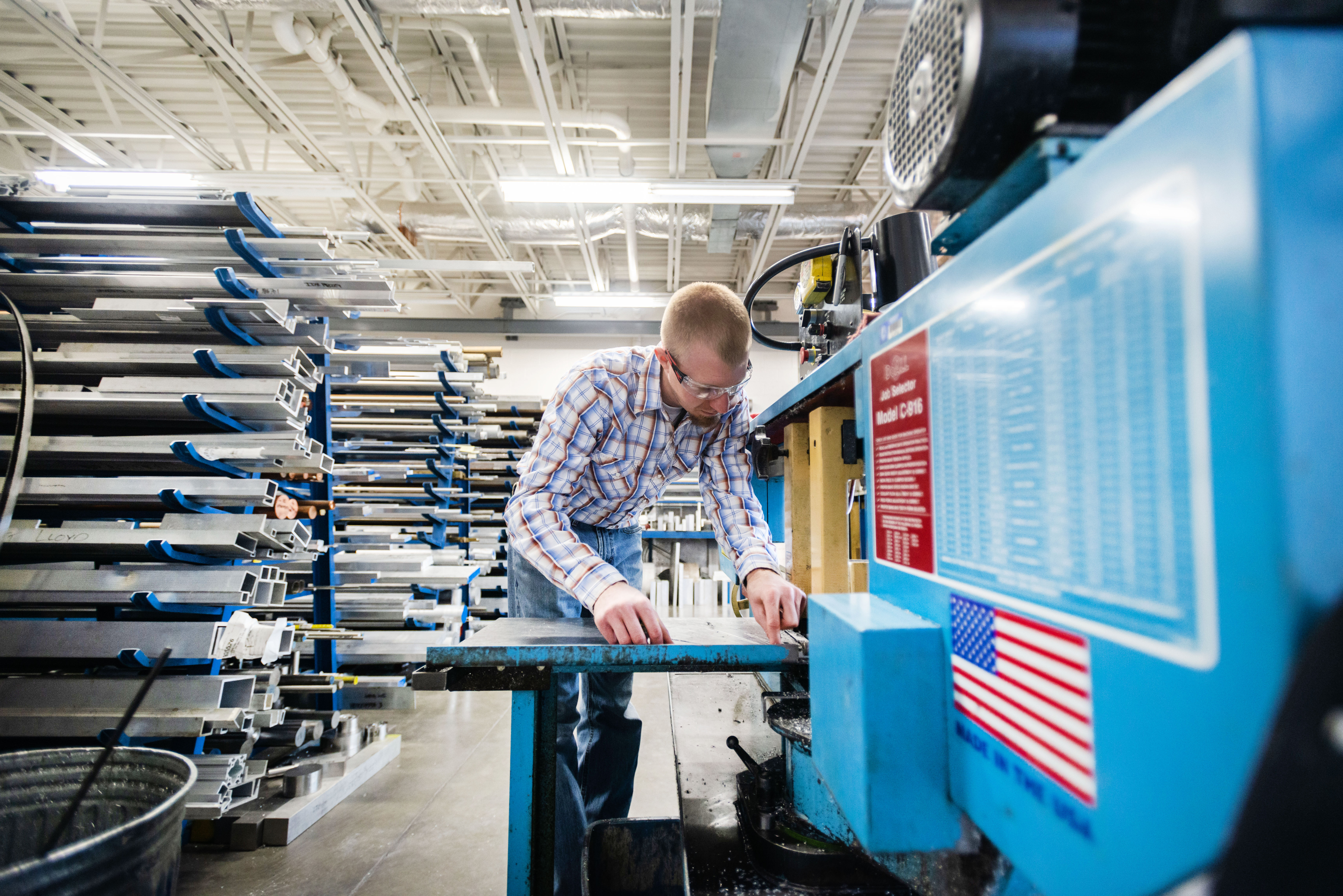 A person working in a manufacturing shop.