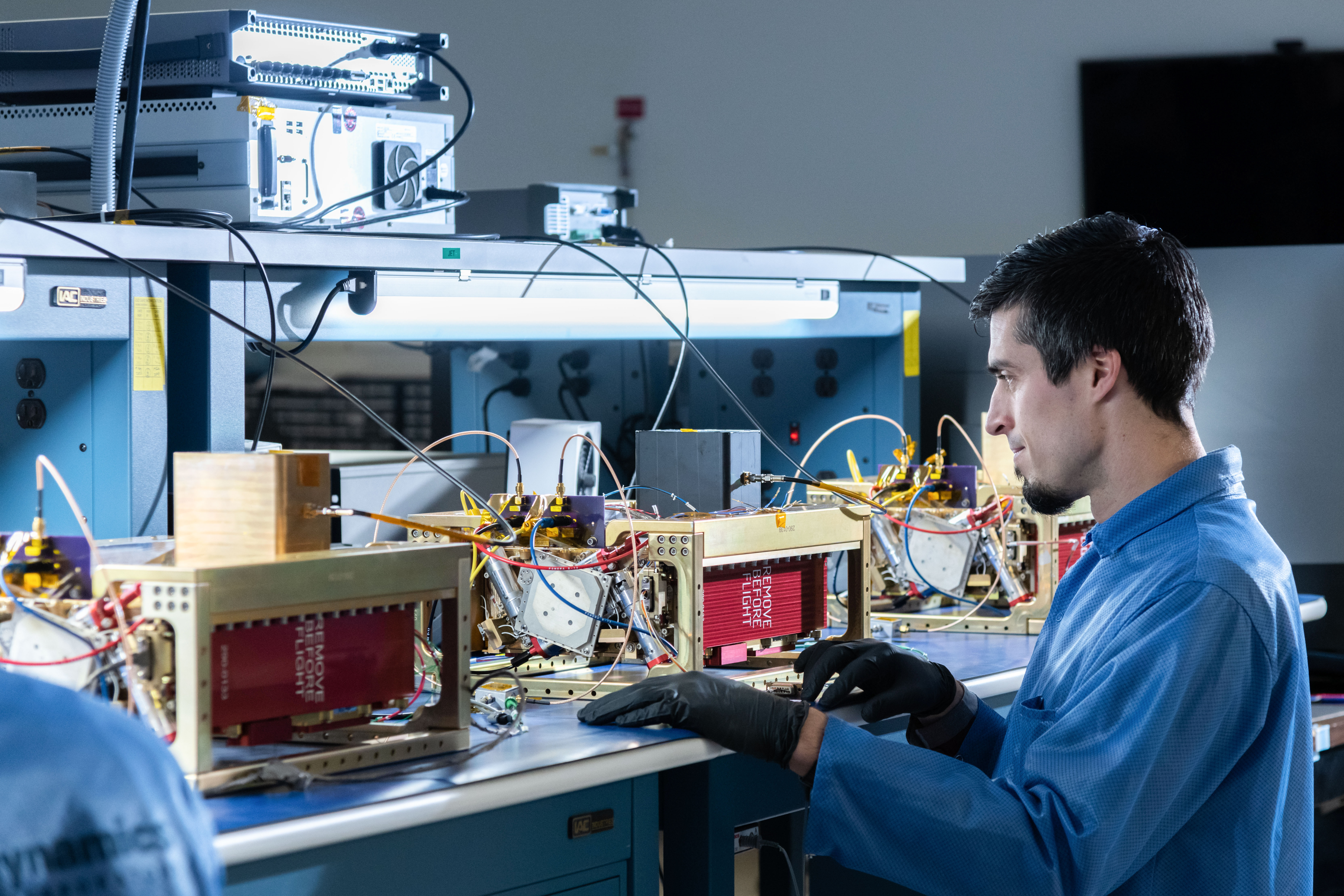 An engineer prepares the SunRISE space vehicles for interferometer-level performance testing.